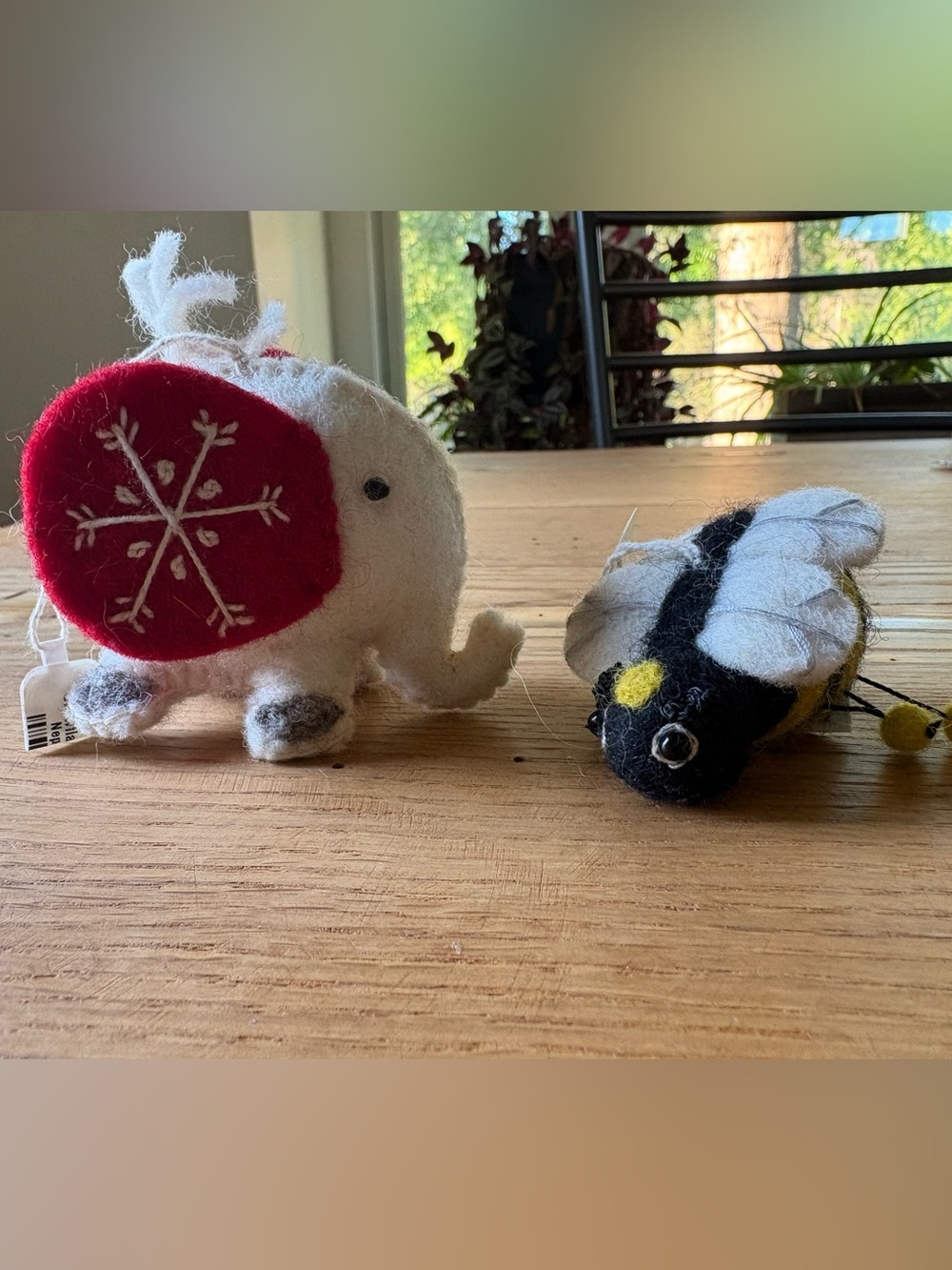 Needle-felted Elephant and Bumblebee ornaments handcrafted. Made in Nepal